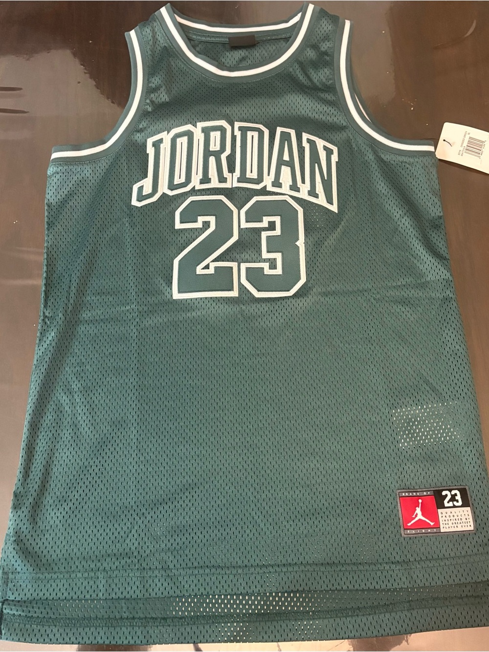 Jordan Teal Mesh Basketball Jersey with White Trim